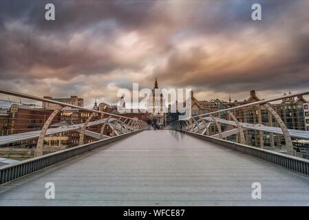 Millennium Bridge Against St Pauls Cathedral During Sunset