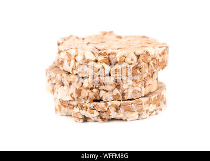 Stack of puffed whole grain crispbread isolated on white background Stock Photo
