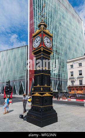 Little Ben, a Grade II listed cast iron miniature clock tower new Victoria Station in the City of Westminster, London, England, UK. Victoria London. Stock Photo