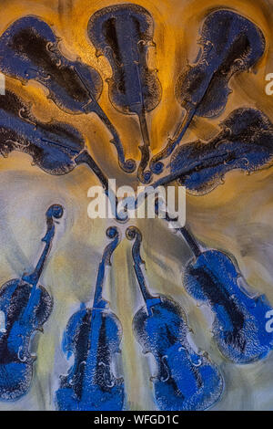 Italy, Positano, representation of violins on a surreal background in a shop window. Stock Photo