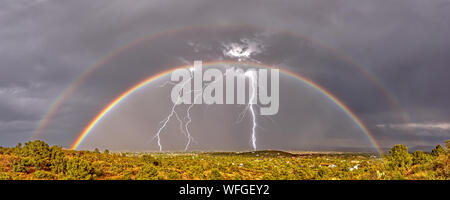 Double Rainbow and Lightning Storm approaching Chino Valley, Arizona, United States Stock Photo