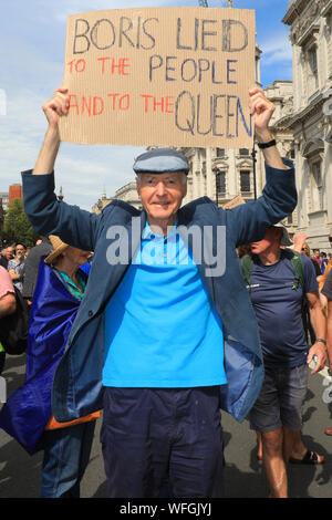 London, 31st Aug 2019. Protesters with flags and banners assemble and demonstrate along Whitehall in Westminster, shouting 'Stop the Coup', against the planned prorogation of Parliament by the government in September. They later march through Westminster and along the Strand. Credit: Imageplotter/Alamy Live News