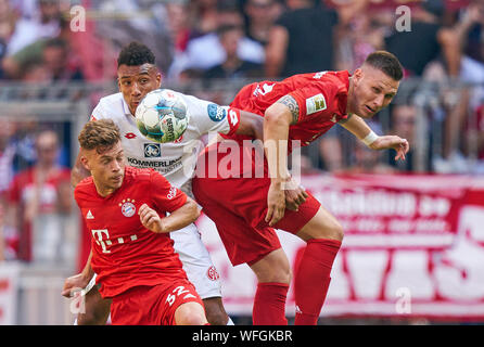 Germany. 31st August 2019. Joshua KIMMICH, FCB 32 Niklas SUELE, FCB 4  compete for the ball, tackling, duel, header, zweikampf, action, fight against Karim ONISIWO, MZ 21  FC BAYERN MUNICH - FSV MAINZ 05  - DFL REGULATIONS PROHIBIT ANY USE OF PHOTOGRAPHS as IMAGE SEQUENCES and/or QUASI-VIDEO -  1.German Soccer League , Munich, August 31, 2019  Season 2019/2020, matchday 03, FCB, München © Peter Schatz / Alamy Live News Stock Photo