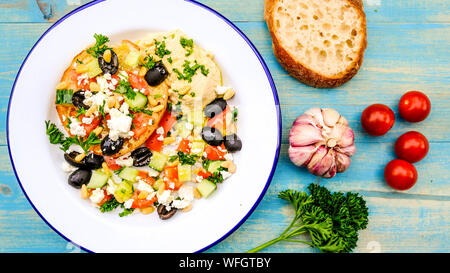 Healthy Mediterranean Style Breakfast With Ciabatta Bread, Black Olives, Feta Cheese and Tomatoes Stock Photo