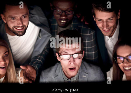 close up.a young programmer working late at the office Stock Photo