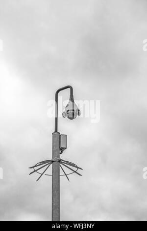 CCTV camera with spiked protection ring Stock Photo