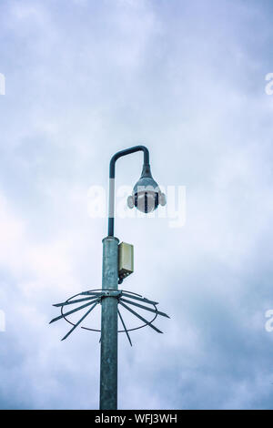 CCTV camera with spiked protection ring Stock Photo