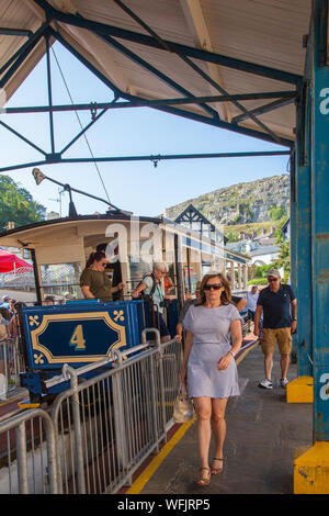 passengers in the Tram station on the tramway traveling up the Great Orme railway Llandudno North Wales  carrying tourists to the summit Stock Photo