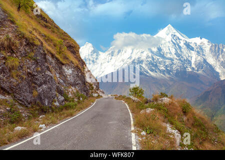 Himalaya snow peaks with scenic mountain road at Uttarakhand India