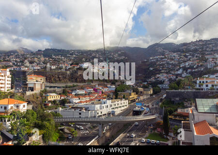 FUNCHAL, PORTUGAL - JULY 11, 2017: Cable car view over the city of Funchal to Monte Stock Photo