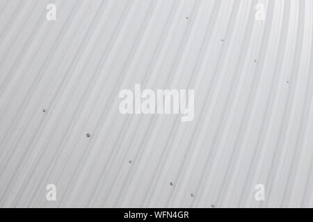 background, texture: surface of primed metal sheet with spots of rust ...