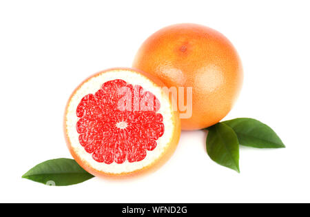 Grapefruit with half slice and leaves isolated on white background with clipping path. Grapefruit isolated, grapefruits. Stock Photo