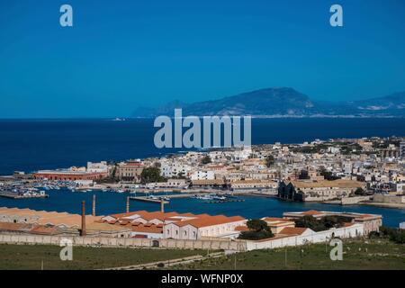 Italy, Sicily, Trapani, Egades archipelago, Favignana, view on the village from the slopes of Mt Santa Caterina, with Trapani and Erice in the back Stock Photo