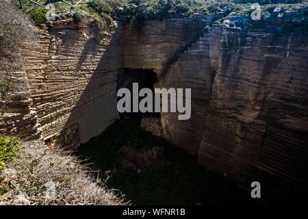 Italy, Sicily, Trapani, Egades archipelago, Favignana, tuff quarries, often transformed in cave dwellings Stock Photo