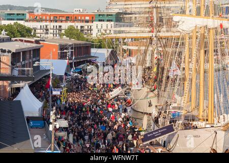 France, Seine Maritime, Rouen, Armada 2019, elevated view on the crowd of visitors and on moored tall ships Stock Photo
