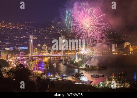 France, Seine Maritime, Canteleu, Armada 2019, elevated view of fireworks, boats, docks and Rouen Flaubert Bridge Stock Photo