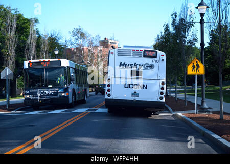Storrs, CT USA. Aug 2019. UCONN shuttle bus services delivering students, faculty, and visitors campus wide. Stock Photo