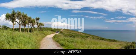 Ireland, Fingal County, northern Dublin suburbs, Howth, cliff hiking trails, family hikers Stock Photo