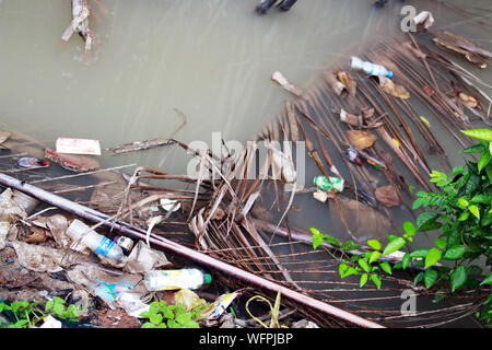 plastic waste on the side of the road in southeast asia. pollution crisis concept Stock Photo