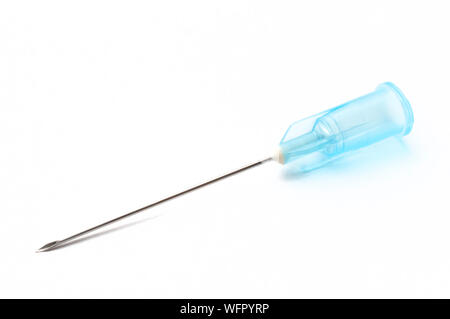 Hypodermic needle on white background. It is used with a siringe to inject substances in the body. Stock Photo