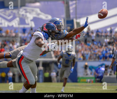 Memphis, USA. 31st Aug, 2019. August 31, 2019: Ole' Miss wide receiver, Jonathan Mingo (1), dives for the ball as Memphis corner back, TJ Carter (2), dives to block the throw, during the NCAA football game between the Ole' Miss Rebels and the Memphis Tigers at Liberty Bowl Stadium in Memphis, TN. Credit: Cal Sport Media/Alamy Live News Stock Photo