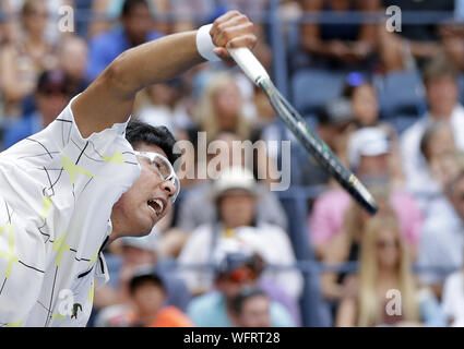 New York, USA. 31st Aug, 2019. Chung Hyeon of South Korea serves to Rafael Nadall of Spain in the 3rd round in Arthur Ashe Stadium at the 2019 US Open Tennis Championships at the USTA Billie Jean King National Tennis Center on Saturday, August 31, 2019 in New York City. Credit: UPI/Alamy Live News Stock Photo