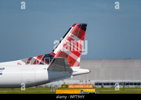 MANCHESTER, UNITED KINGDOM - AUGUST 24, 2019: Loganair Saab 2000 tail livery Stock Photo