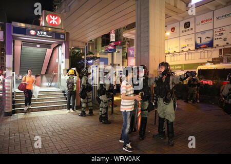 Hong Kong, China. 31st Aug, 2019. 31st August 2019. Hong Kong Anti Extradition Bill protests. After a day of many violent clashes with police angry residents surrounded Mong Kok Police Station to show their anger towards police actions that day Credit: David Coulson/Alamy Live News Stock Photo