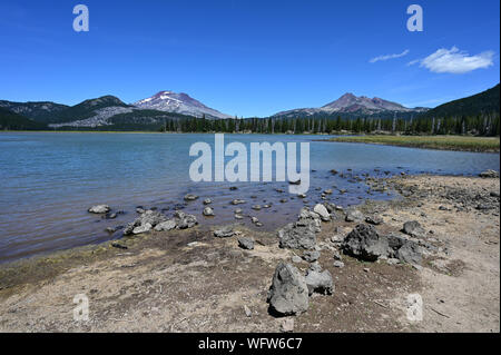 South Sister and Broken Top volcanoes from Sparks Lake near Sisters, Oregon. Stock Photo