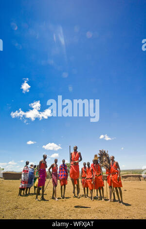Group of Maasai men doing their jumping dance celebrating the rite of passage to welcome young men to the next stage of their lives, Kenya, East Afric Stock Photo