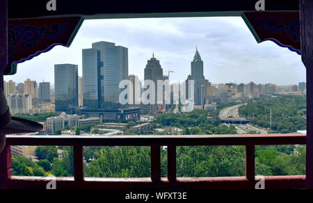 Urumqi modern city skyline from Hongshan pagoda balcony - Xinjiang Uygur Autonomous province, China Stock Photo