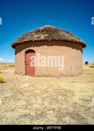 Rustic Traditional Uru House Made of  Adobes in the Bolivian Altiplano Stock Photo