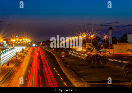 Beautiful red motion trail in the Blue Hour. From Muscat, Oman. Stock Photo