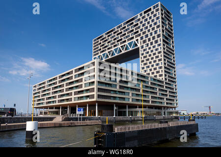 Modern apartment building in the contemporary housing project in the Houthaven neighbourhood and ferry  departure to NDSM port area