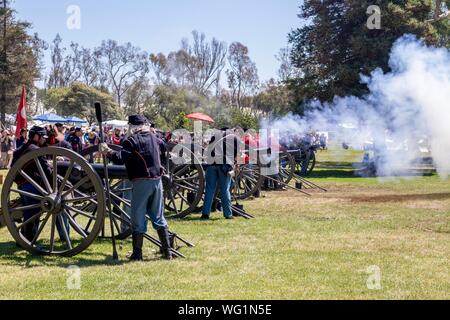 Union soldiers firing cannons during a Civil War reenactment Stock Photo