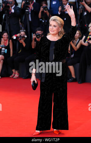Venice, Italy. 31st Aug, 2019. Actress Catherine Deneuve poses on the red carpet for the premiere of the film 'Joker' during the 76th Venice International Film Festival in Venice, Italy, Aug. 31, 2019. Credit: Zhang Cheng/Xinhua/Alamy Live News Stock Photo