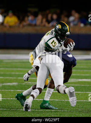 August 31, 2019: Norfolk State Spartans WR #15 Da'Kendall James is hit by ODU Monarchs WR #17 John Johnson after catching the ball during a NCAA football game between the Old Dominions Monarchs and the Norfolk State Spartans at S.B. Ballard Stadium in Norfolk, VA. Justin Cooper/CSM Stock Photo