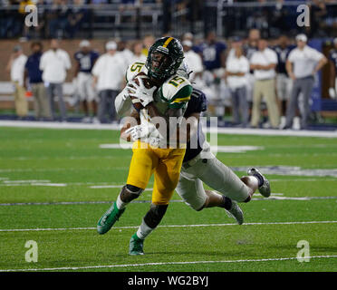 August 31, 2019: Norfolk State Spartans WR #15 Da'Kendall James is dragged down from behind by ODU Monarchs CB #11 Robert Scott during a NCAA football game between the Old Dominions Monarchs and the Norfolk State Spartans at S.B. Ballard Stadium in Norfolk, VA. Justin Cooper/CSM Stock Photo