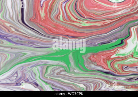 Pink purple and yellow color mix marble texture design, fluid art painting, contemporary art. Stock Photo