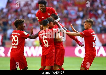 Muenchen, Germany 31st August 2019: 1. BL - 19/20 - FC Bayern Munich Vs. FSV FSV FSV Mainz 05 Benjamin Pavard (Bayern Munich) celebrates after his goal to 1: 1 with Kingsley Coman (Bayern Munich), Thiago (Bayern Munich), David Alaba (Bayern Munich) and Joshua Kimmich (FC Bayern Munich ) jubilation/joy/emotion/goaljubel/goalkeeper/goalkeeper // DFL regulations prohibit any use of photographs as image sequences and/or quasi-video. // | usage worldwide Stock Photo