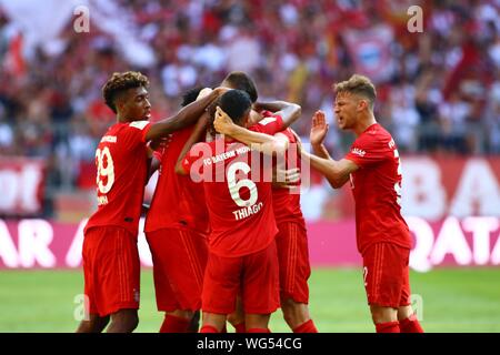 Muenchen, Germany 31st August 2019: 1. BL - 19/20 - FC Bayern Munich Vs. FSV FSV FSV Mainz 05 Benjamin Pavard (Bayern Munich) celebrates after his goal to 1: 1 with Kingsley Coman (Bayern Munich), Thiago (Bayern Munich), David Alaba (Bayern Munich) and Joshua Kimmich (FC Bayern Munich ) jubilation/joy/emotion/goaljubel/goalkeeper/goalkeeper // DFL regulations prohibit any use of photographs as image sequences and/or quasi-video. // | usage worldwide Stock Photo