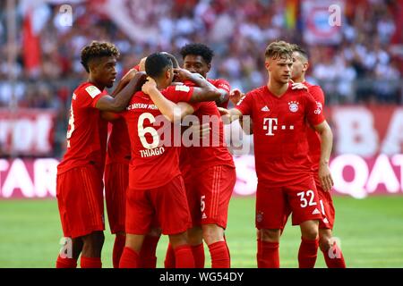 Muenchen, Germany 31st August 2019: 1. BL - 19/20 - FC Bayern Munich Vs. FSV FSV FSV Mainz 05 Benjamin Pavard (Bayern Munich) celebrates after his goal to 1: 1 with Kingsley Coman (Bayern Munich), Thiago (Bayern Munich), David Alaba (Bayern Munich) and Joshua Kimmich (FC Bayern Munich ) jubilation/joy/emotion/goaljubel/goalkeeper/goalkeeper // DFL regulations prohibit any use of photographs as image sequences and/or quasi-video. // | usage worldwide Stock Photo