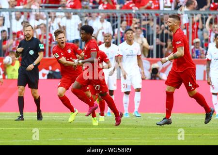 Muenchen, Germany 31st August 2019: 1. BL - 19/20 - FC Bayern Munich Vs. FSV FSV FSV Mainz 05 David Alaba (Bayern Munich) celebrates after his goal to 2: 1 with Joshua Kimmich (Bayern Munich) jubilation/joy/emotion/goaljubel/goalkeeper/goalkeeper // DFL regulations prohibit any use of photographs as image sequences and/or quasi-video. // | usage worldwide Stock Photo