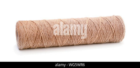 Spool of brown natural rough twine isolated on white background Stock Photo