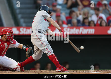 Anaheim, USA. 31st Aug, 2019. August 31, 2019: Boston Red Sox second baseman Brock Holt (12) singles during the game between the Boston Red Sox and the Los Angeles Angels of Anaheim at Angel Stadium in Anaheim, CA, (Photo by Peter Joneleit, Cal Sport Media) Credit: Cal Sport Media/Alamy Live News Stock Photo