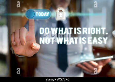 Writing note showing Do What Is Right Not What Is Easy. Business concept for willing to stand up for what is right Modern technology Lady front presen Stock Photo