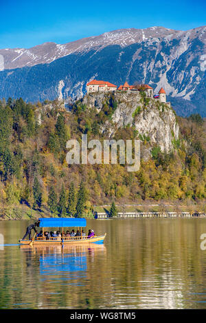 BLED ,SLOVENIA - NOVEMBER 11, 2017 -Traditional Pletna boat on the lake. Bled lake Slovenia Stock Photo