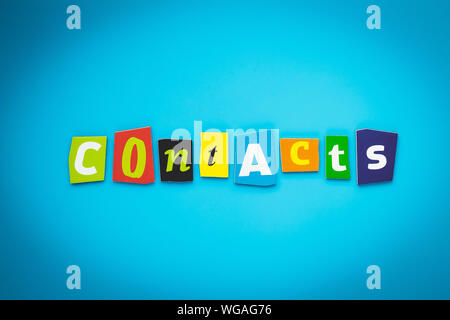 Single word - contacts. Text on blue background from colorful letters. Message on poster. Headline on card. Multicolored inscription on banner. Stock Photo