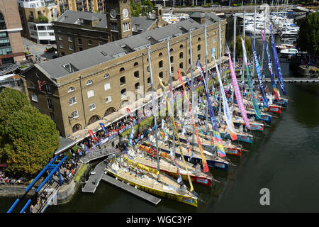 Yachts taking part in the Clipper Round the World Race are moored at St Katharine Docks Marina by the river Thames in central London, as the teams prepare for their departure down the river.