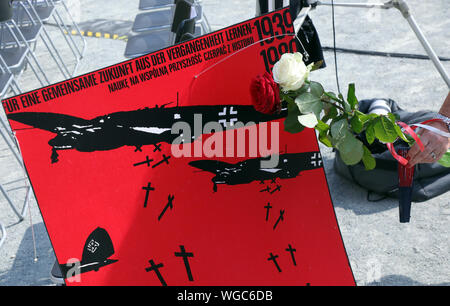 Berlin, Germany. 01st Sep, 2019. A poster of the German-Polish Society Berlin lies at a commemoration ceremony of the German Poland Institute on the occasion of the 80th anniversary of the attack of German troops on Poland in front of the ruins of the Anhalter railway station. The German invasion of Poland on 1 September 1939 marked the beginning of the Second World War. Credit: Wolfgang Kumm/dpa/Alamy Live News Stock Photo